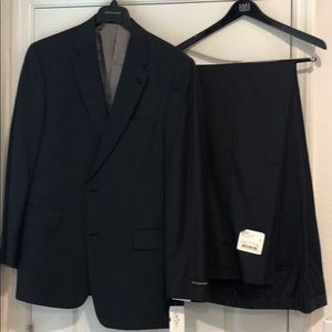 Black pinstripe suit.